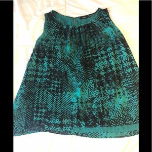 Green and black sleeveless blouse